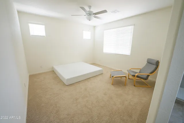 a bathroom with a shower sink and mirror