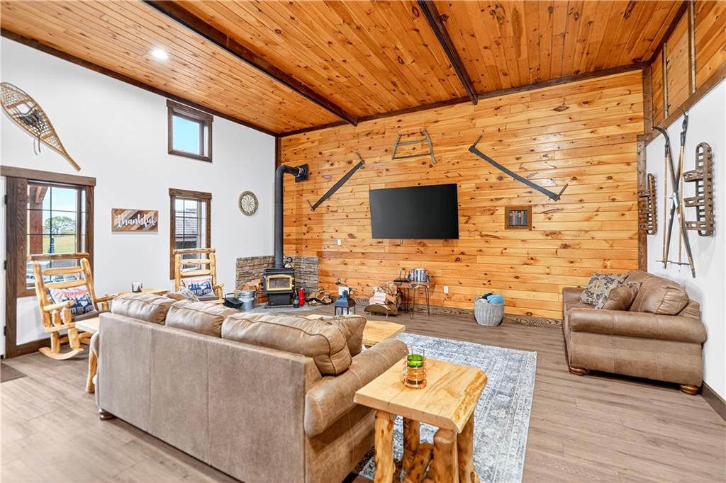 341 Skyview Road Stahlstown, PA 15687 - Photo 12 of 33 a living room with fireplace furniture and a flat screen tv