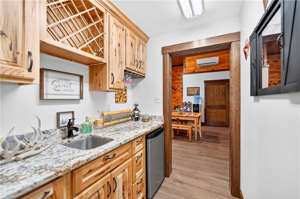 341 Skyview Road Stahlstown, PA 15687 - Photo 16 of 33 a kitchen with granite countertop sink stove and cabinets