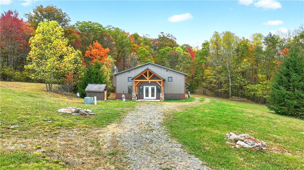 341 Skyview Road Stahlstown, PA 15687 - Photo 4 of 33 a house view with a outdoor space