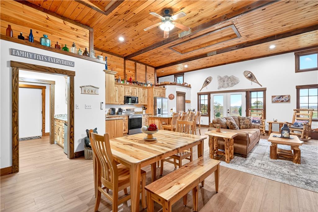 341 Skyview Road Stahlstown, PA 15687 - Photo 7 of 33 a outdoor space with lots of furniture and wooden floor