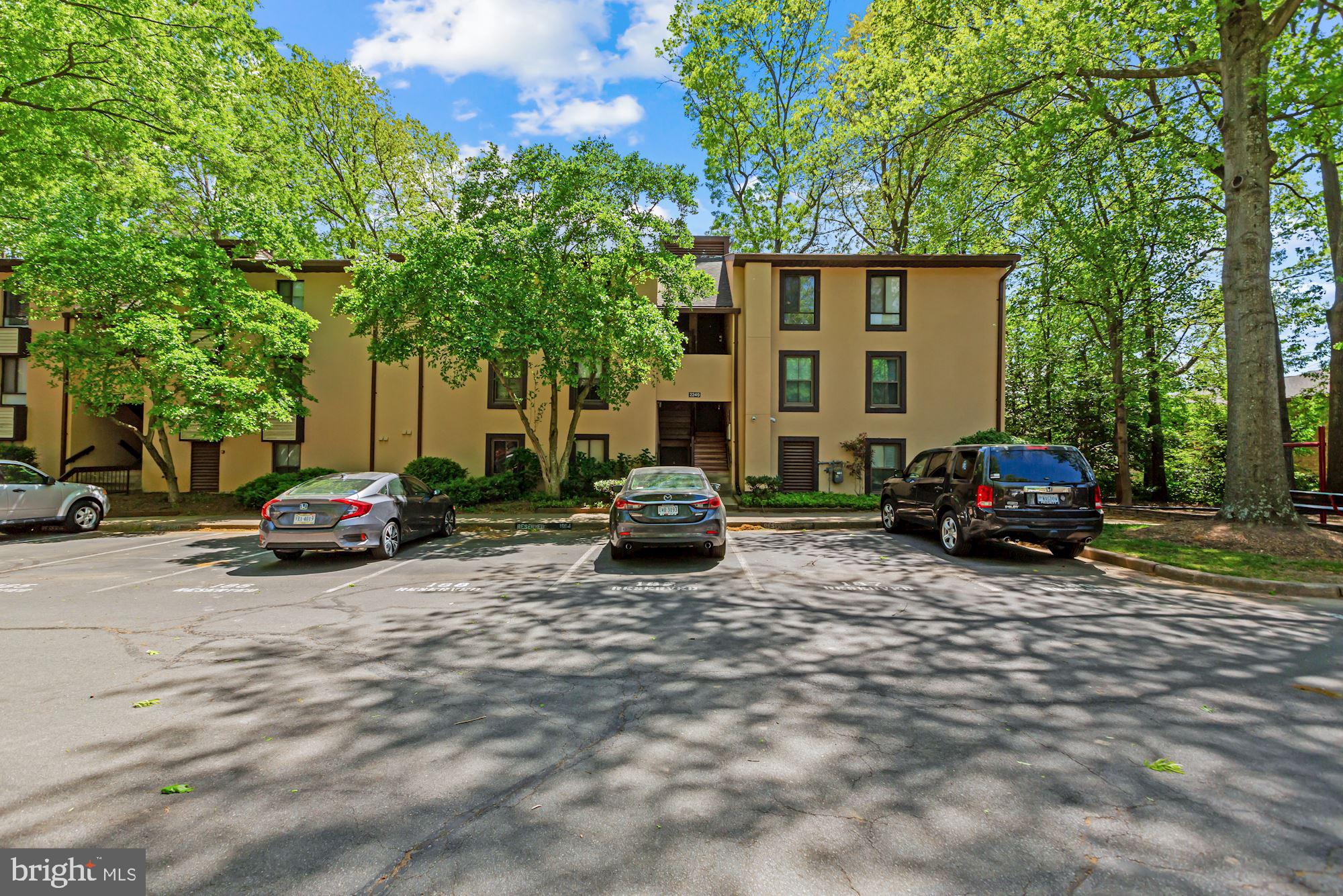 2249 Castle Rock Square, Unit 1B Reston, VA 20191 - Photo 1 of 5 Front of Building and Reserved Parking