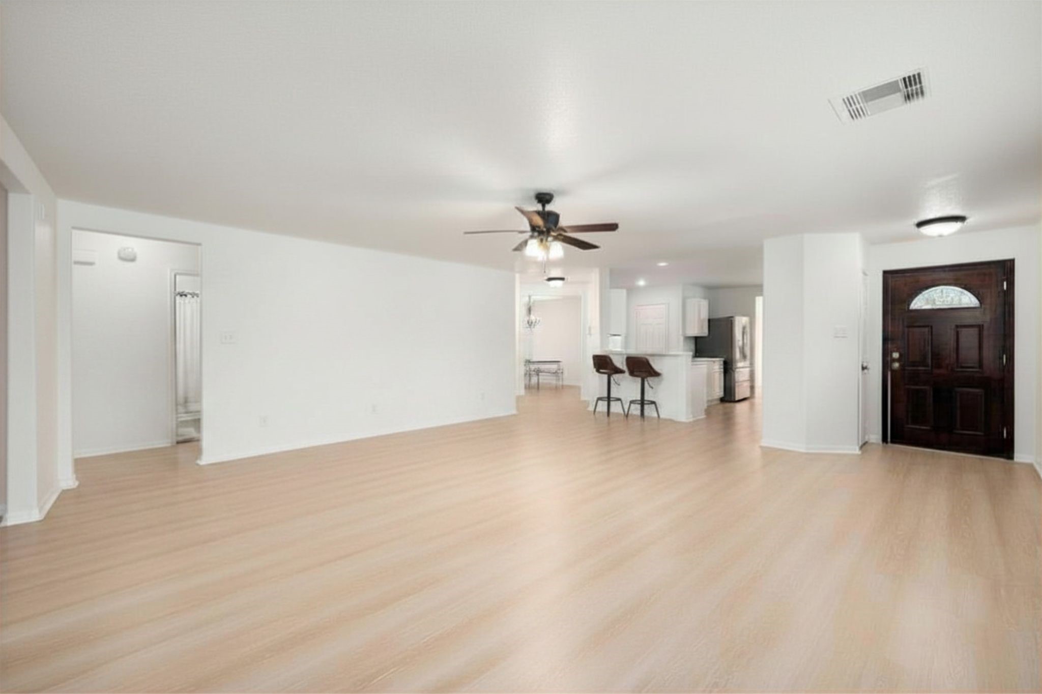 5038 Natchez Ridge Court Katy, TX 77449 - Photo 7 of 26 a view of a livingroom with a table and chairs