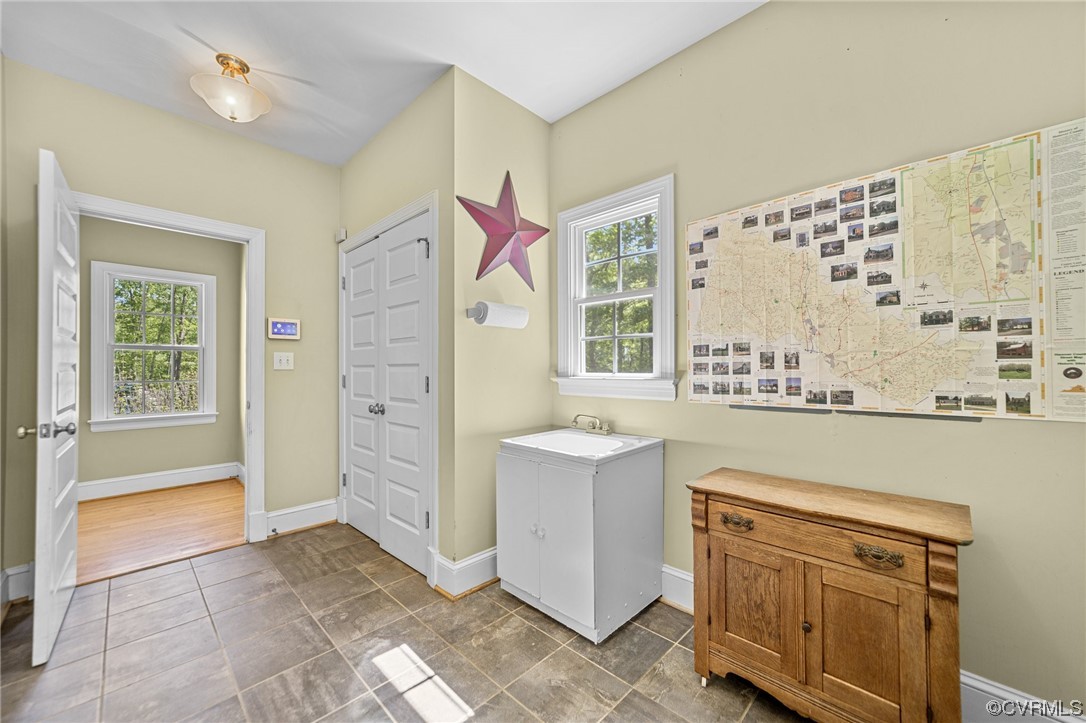 15163 Rice Road Beaverdam, VA 23015 - Photo 12 of 50 a kitchen with a stove a sink and a refrigerator