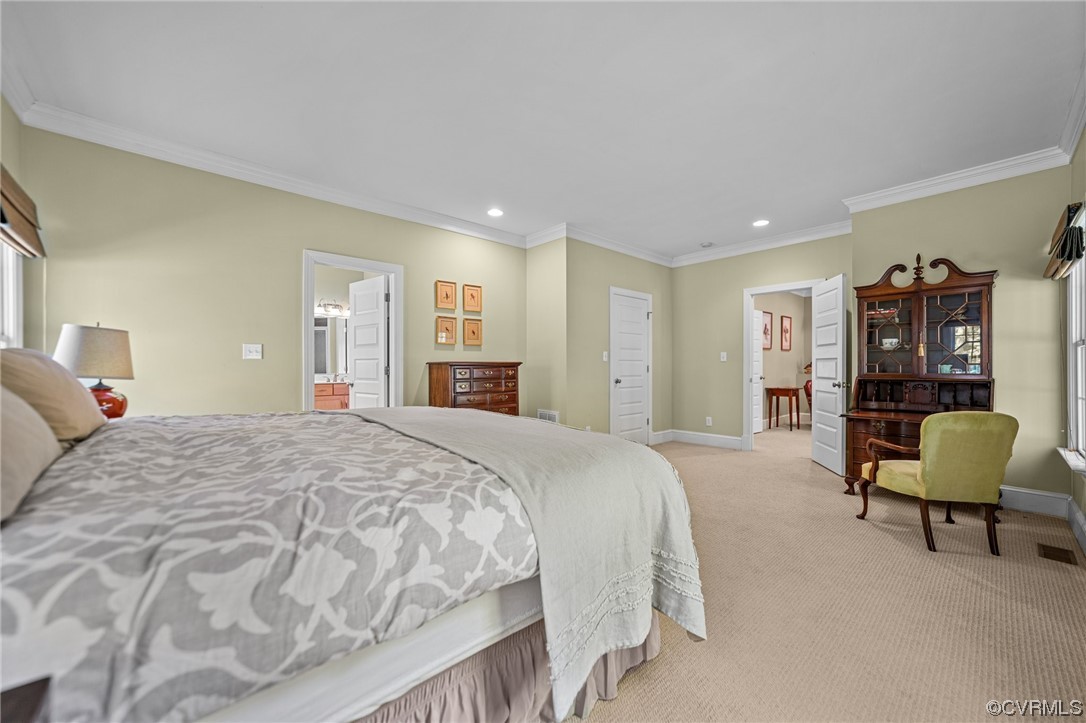15163 Rice Road Beaverdam, VA 23015 - Photo 15 of 50 a spacious bedroom with a bed a chair and dresser in it