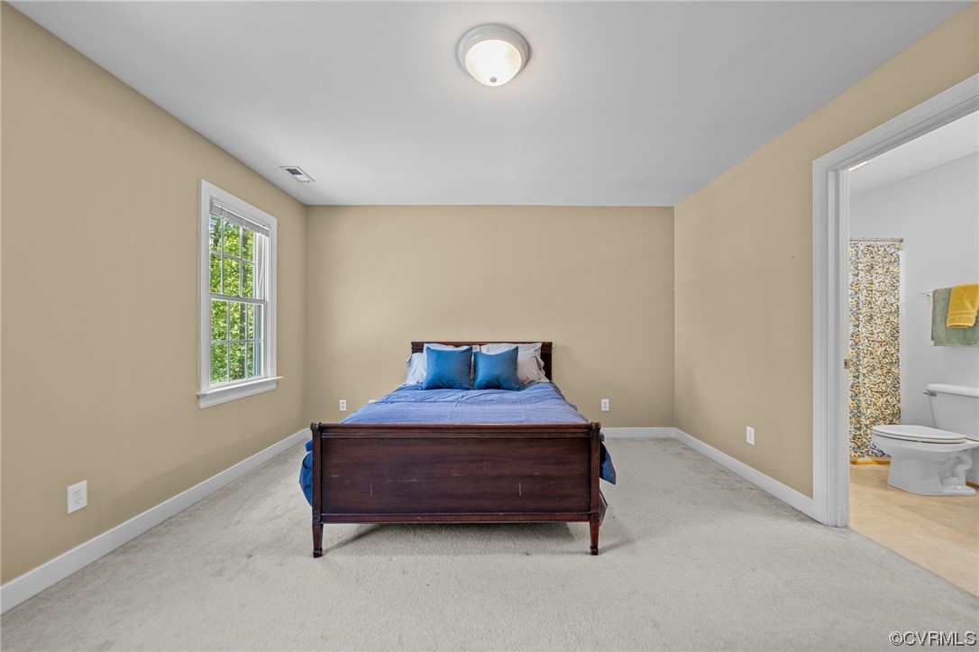 15163 Rice Road Beaverdam, VA 23015 - Photo 18 of 50 a room with a bed and a window