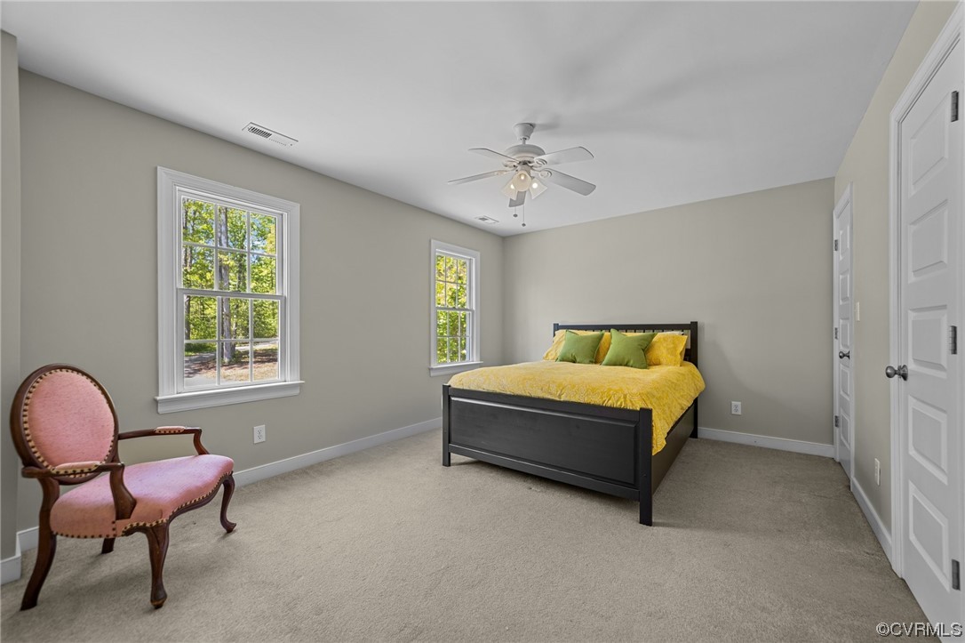 15163 Rice Road Beaverdam, VA 23015 - Photo 20 of 50 a bedroom with a bed chair and window