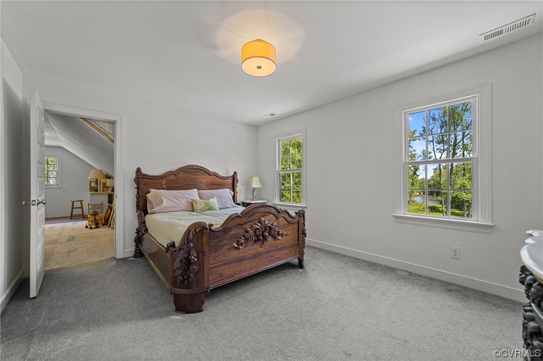 15163 Rice Road Beaverdam, VA 23015 - Photo 22 of 50 a bedroom with a bed and window