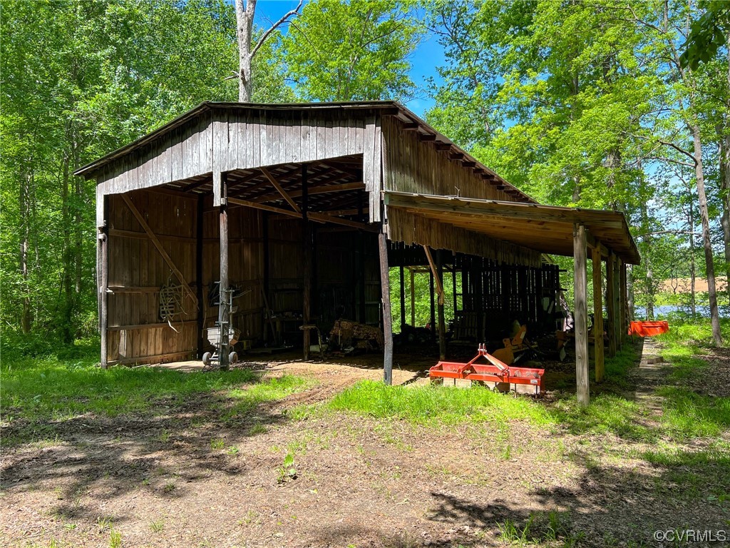 15163 Rice Road Beaverdam, VA 23015 - Photo 48 of 50 a view of a barn with a small yard