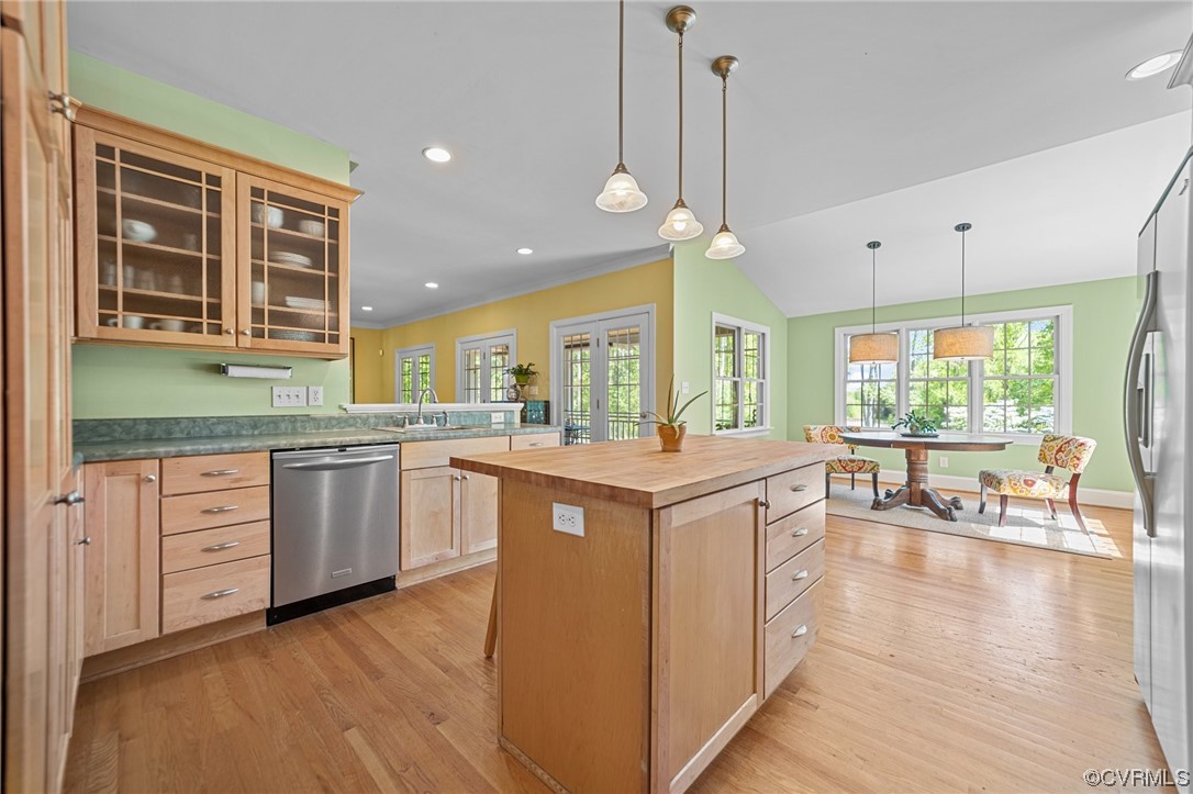 15163 Rice Road Beaverdam, VA 23015 - Photo 7 of 50 a kitchen with a sink stove and wooden cabinets