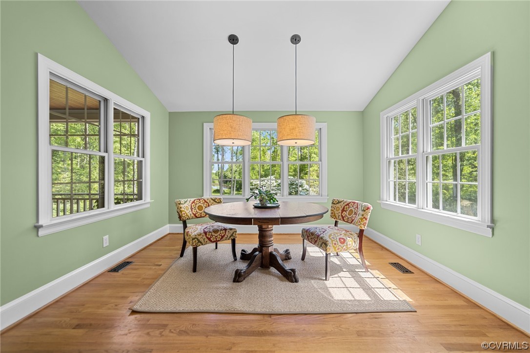 15163 Rice Road Beaverdam, VA 23015 - Photo 8 of 50 a dining room with furniture a rug and a large window