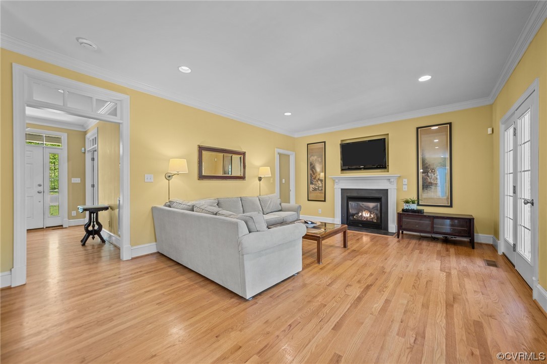15163 Rice Road Beaverdam, VA 23015 - Photo 9 of 50 a living room with furniture and a fireplace