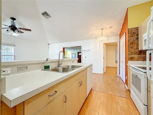 a bedroom with furniture and wooden floor