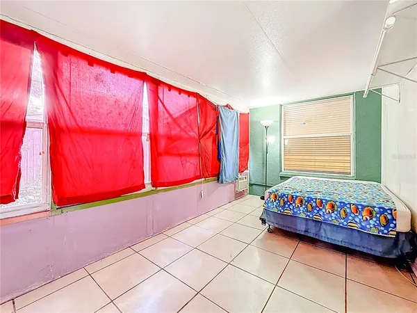 a view of a house with a large window