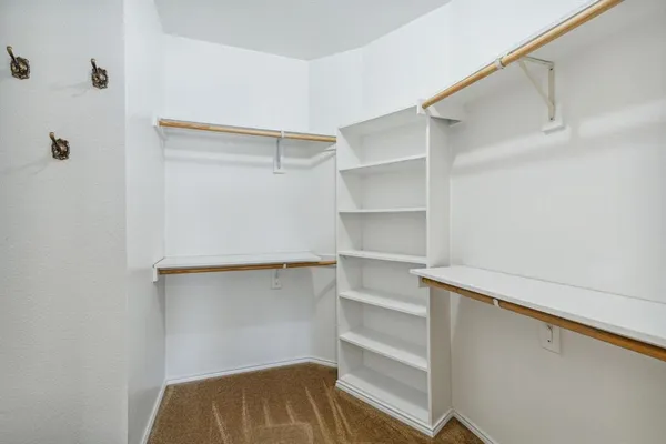 a bathroom with a tub and sink