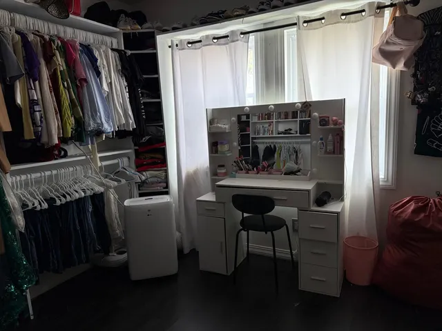 a shelf with books and knick knacks on it