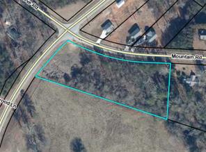 585 Mountain Road Westminster, SC 29693 - Photo 20 of 20 Discover the expansive acreage of this lot, perfect for building your dream home.