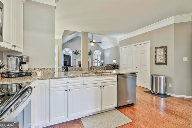 a view of a dining room with furniture