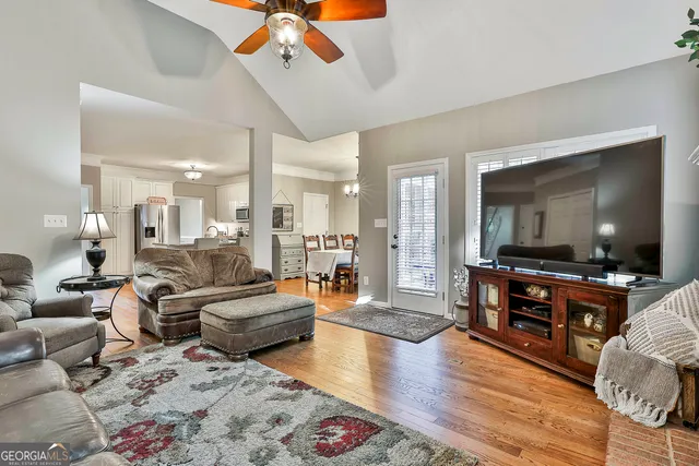 a spacious bedroom with a bed and a couch