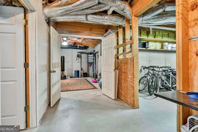 a view of a patio with wooden floor and fence