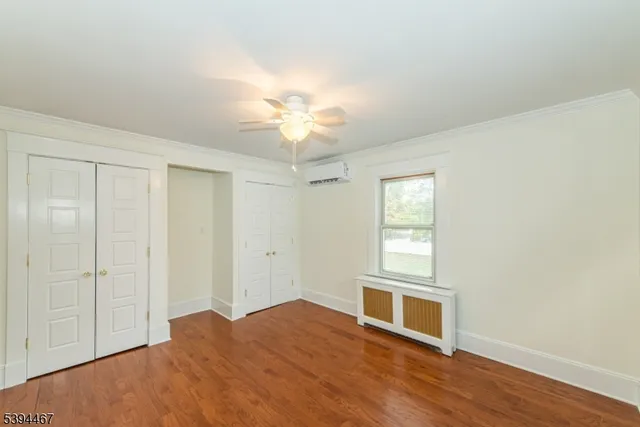 a bathroom with a toilet sink and shower