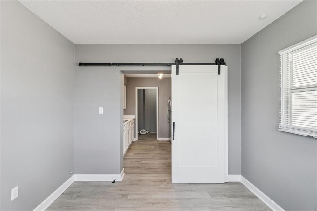 331 Walter Avenue Frostproof, FL 33843 - Photo 14 of 21 a view of hallway with wooden floor