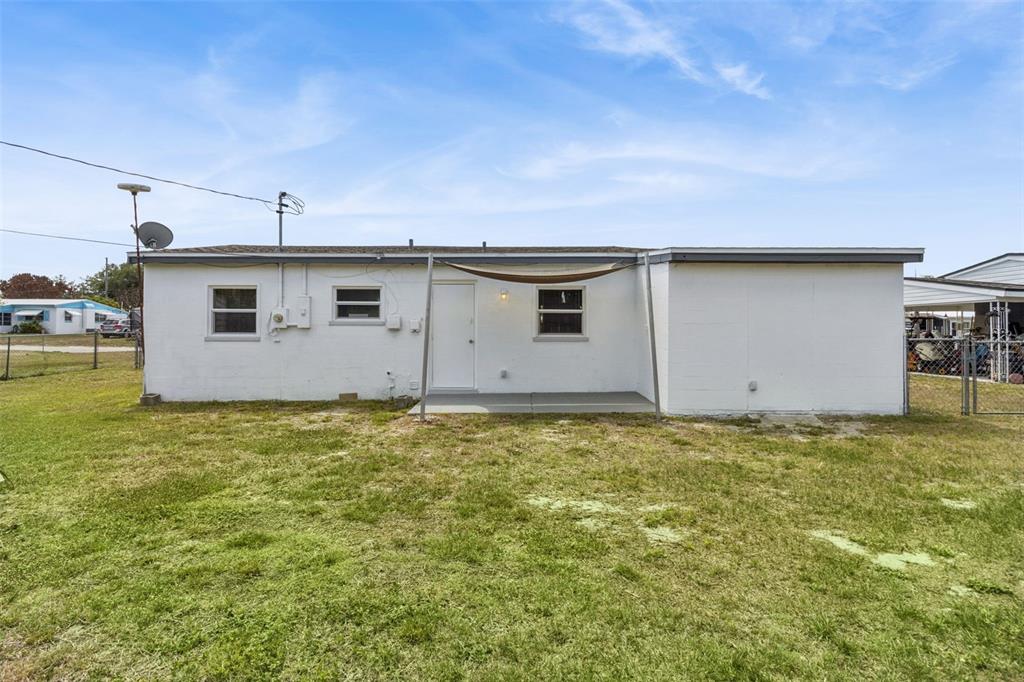 331 Walter Avenue Frostproof, FL 33843 - Photo 18 of 21 a backyard of a house