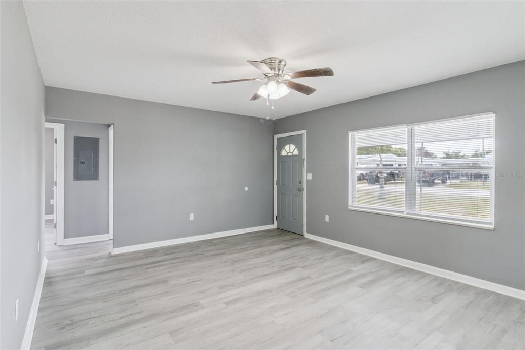 331 Walter Avenue Frostproof, FL 33843 - Photo 4 of 21 a view of an empty room with a window