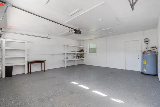 a view of a storage and utility room with empty racks