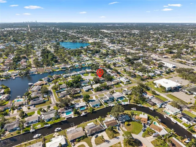 an aerial view of residential building with parking space