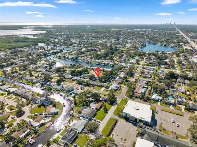 an aerial view of residential building with parking space