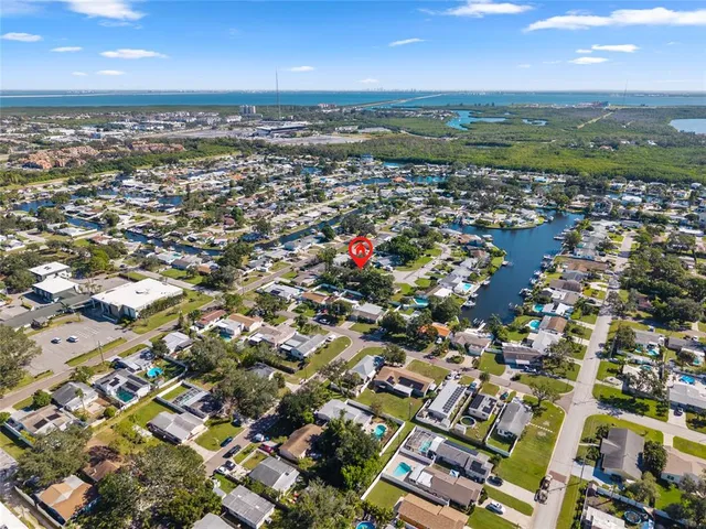 an aerial view of residential building with parking space