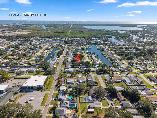 an aerial view of residential building and ocean
