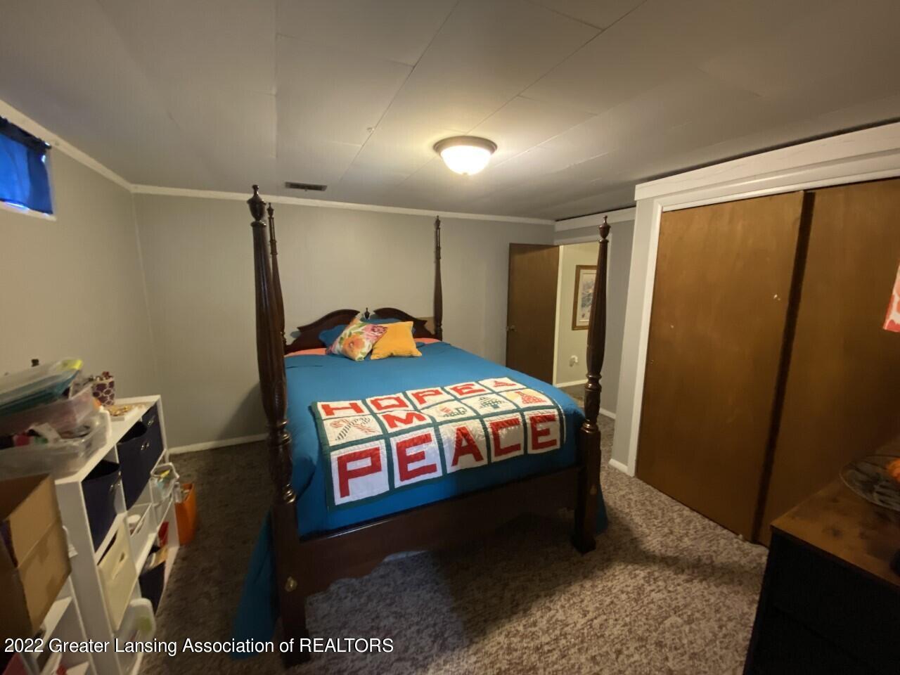 1100 Northcrest Road Lansing, MI 48906 - Photo 27 of 36 besement bedroom