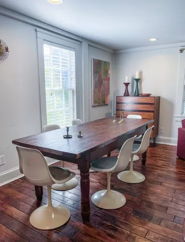 a kitchen with stainless steel appliances a stove sink and a refrigerator