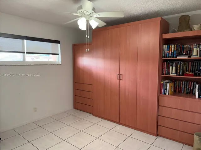 a view of a livingroom with a bookshelf
