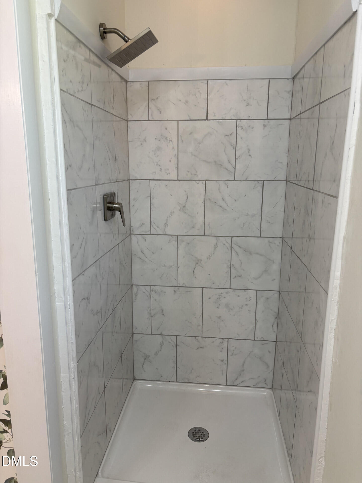 5612 Falls Of Neuse Road, Unit D Raleigh, NC 27609 - Photo 12 of 14 a bathroom with a shower