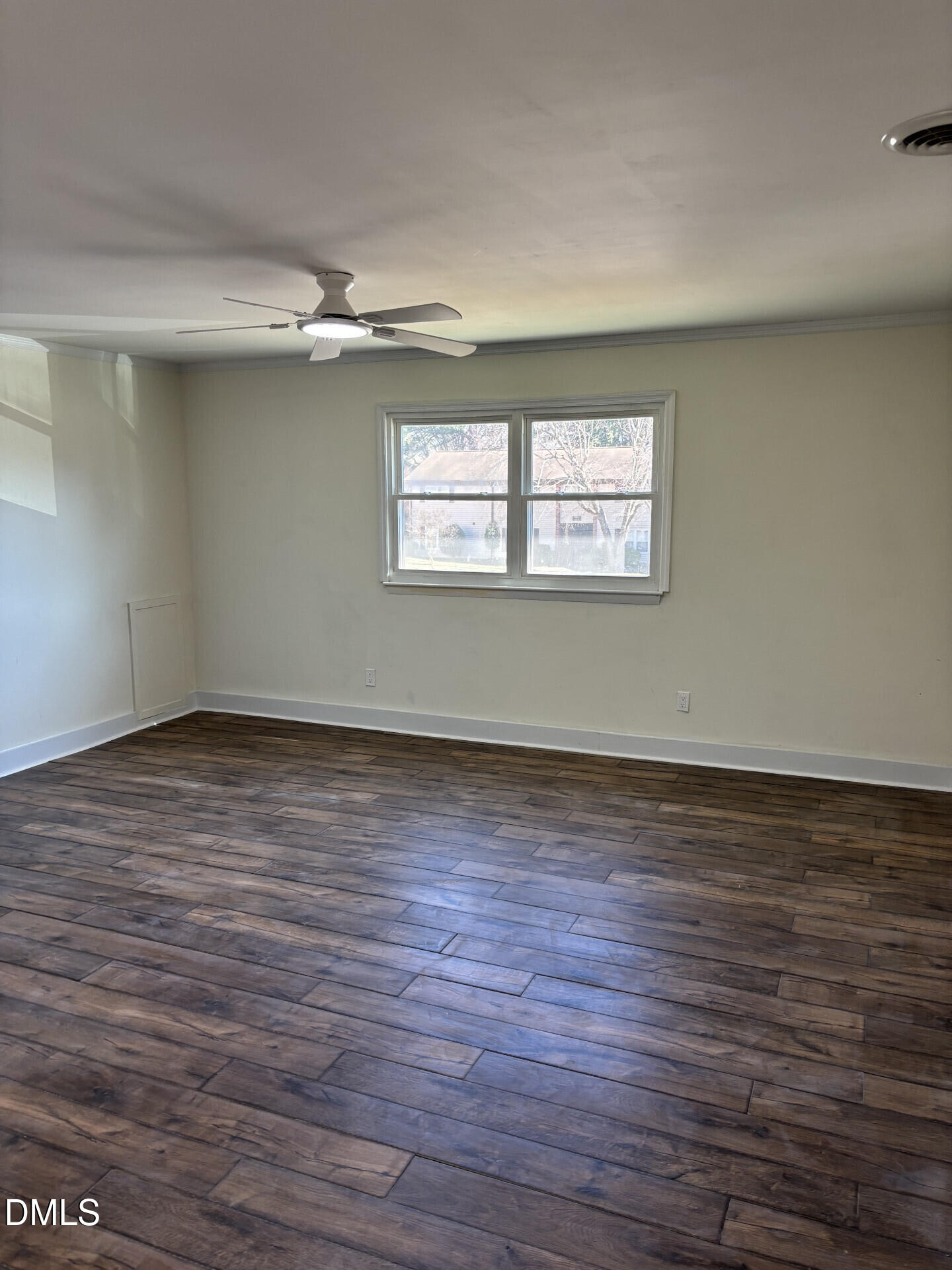 5612 Falls Of Neuse Road, Unit D Raleigh, NC 27609 - Photo 6 of 14 wooden floor in an empty room