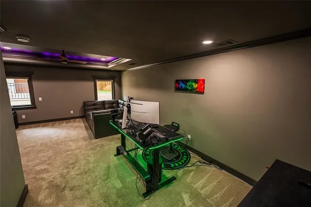 a spacious bedroom with a bed and a window