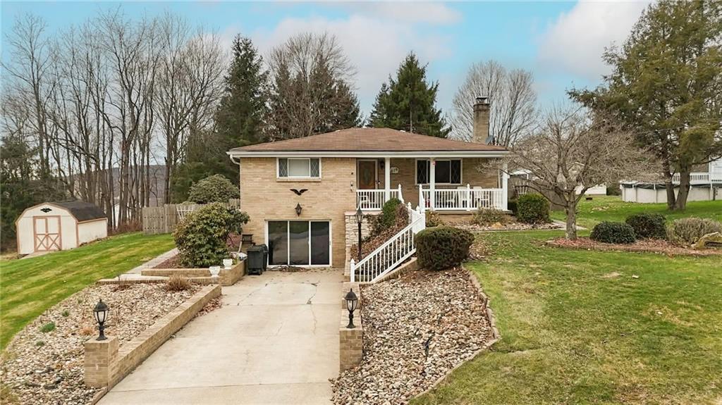 616 Barbara Street Seward, PA 15954 - Photo 1 of 2 a front view of a house with a yard
