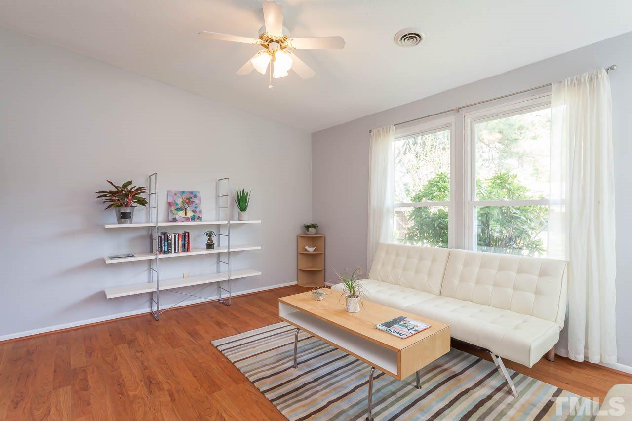 859 Hadley Road Raleigh, NC 27610 - Photo 2 of 17 Vaulted ceilings and plenty of windows allow for natural light in every room.