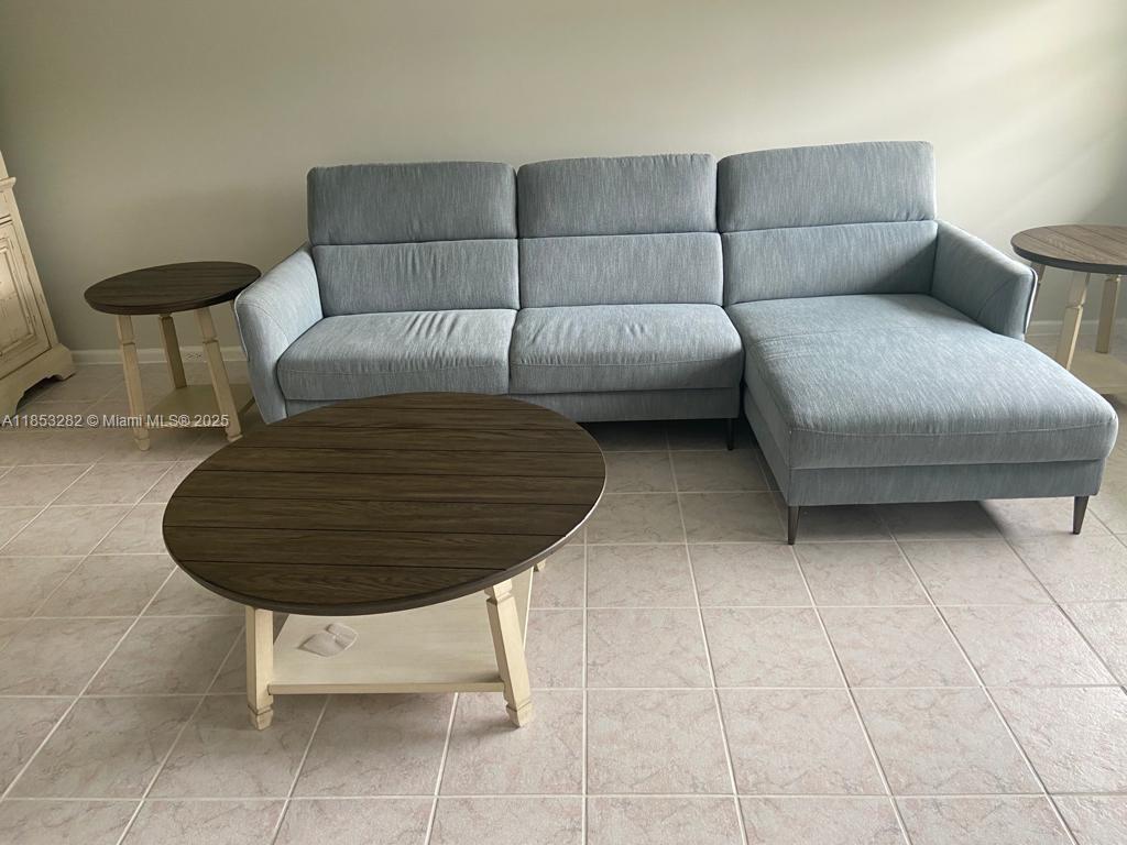 4050 Ainslie Drive, Unit 4050 Boca Raton, FL 33434 - Photo 15 of 17 a living room with furniture