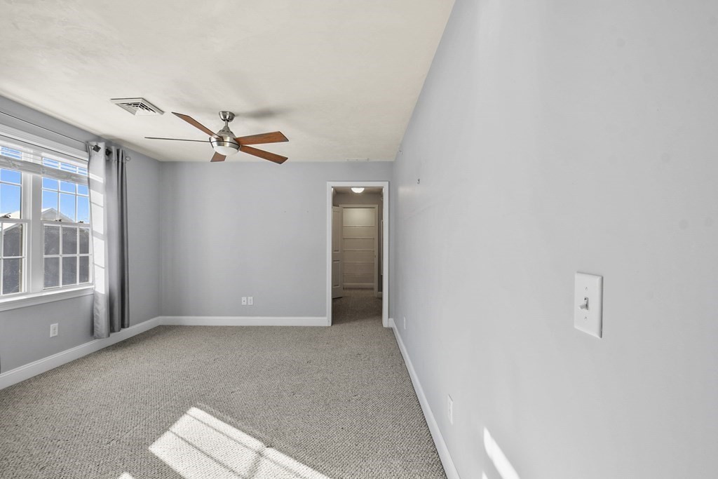 211 Barre Paxton Road, Unit 2 Rutland, MA 01543 - Photo 15 of 30 a view of an empty room with a window