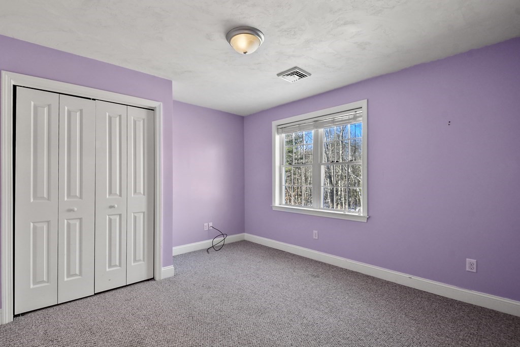 211 Barre Paxton Road, Unit 2 Rutland, MA 01543 - Photo 20 of 30 an empty room with a window