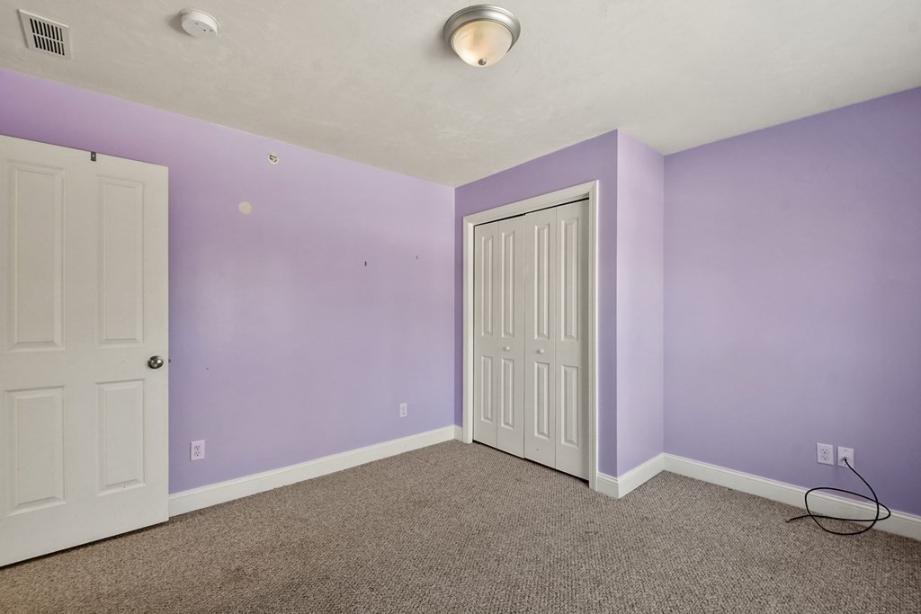 211 Barre Paxton Road, Unit 2 Rutland, MA 01543 - Photo 21 of 30 an empty room with windows