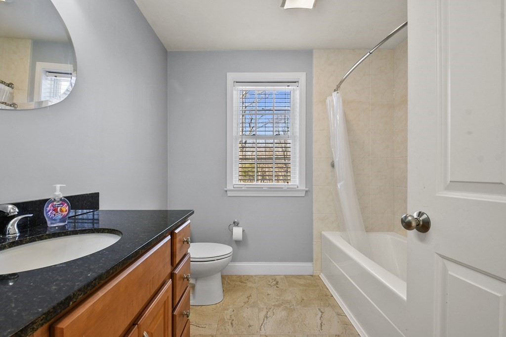 211 Barre Paxton Road, Unit 2 Rutland, MA 01543 - Photo 23 of 30 a bathroom with a sink a toilet and bathtub