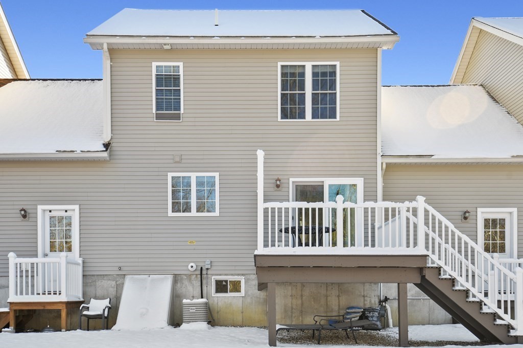 211 Barre Paxton Road, Unit 2 Rutland, MA 01543 - Photo 25 of 30 a view of a house with wooden deck
