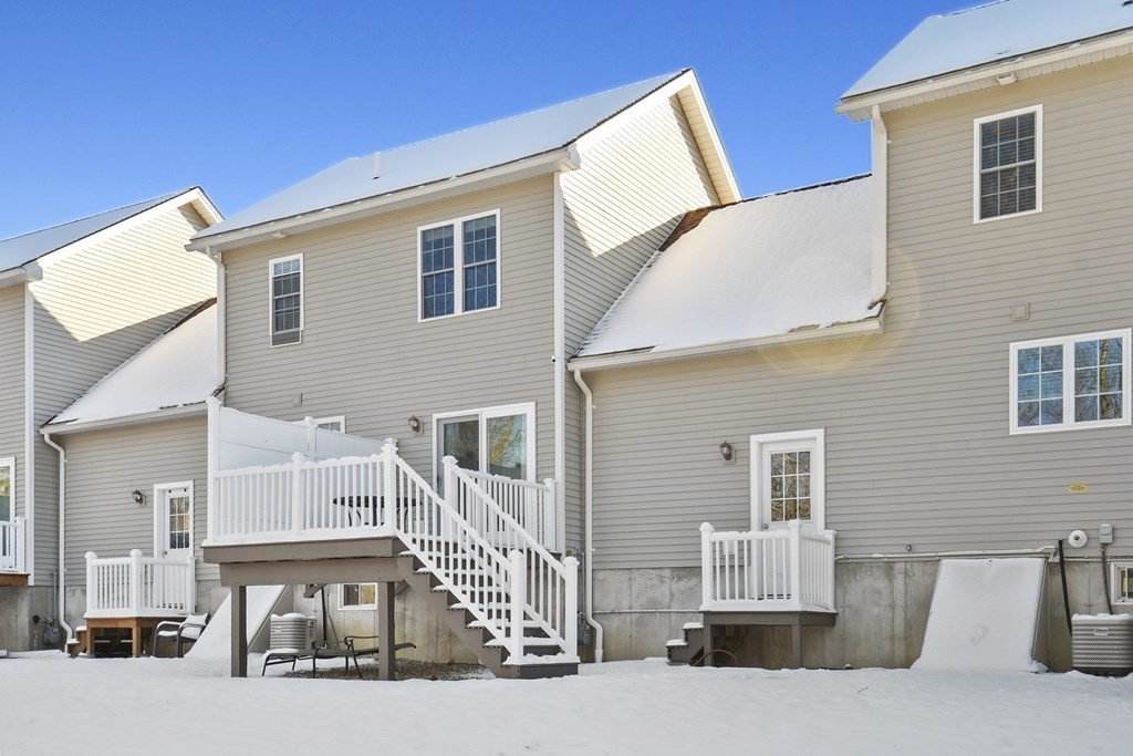 211 Barre Paxton Road, Unit 2 Rutland, MA 01543 - Photo 26 of 30 a view of a house with a patio