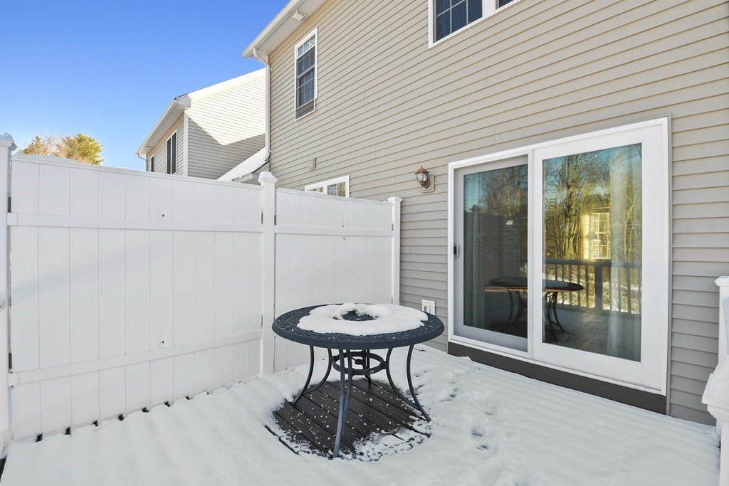 211 Barre Paxton Road, Unit 2 Rutland, MA 01543 - Photo 27 of 30 a table and chairs in a patio
