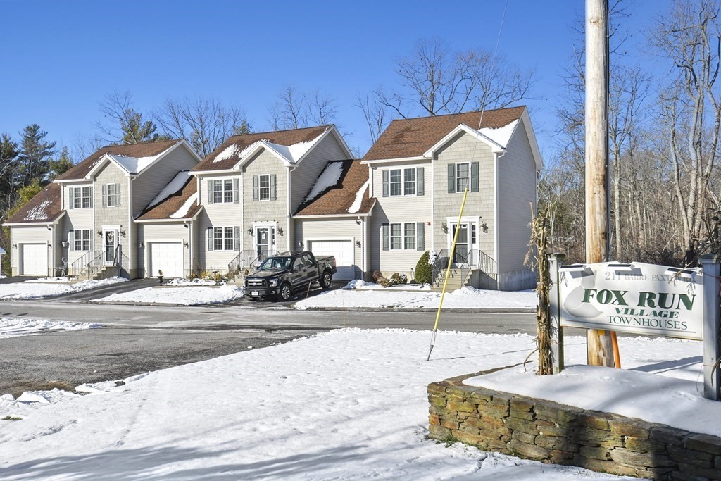 211 Barre Paxton Road, Unit 2 Rutland, MA 01543 - Photo 30 of 30 a view of a white house
